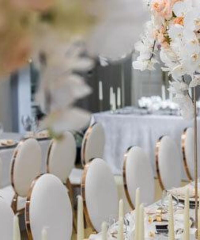 Venue sustainability is reflected in an image of white seats and flowers.