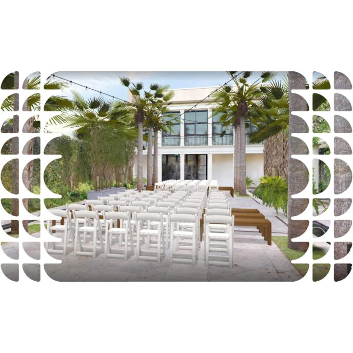 An outdoor wedding space features rows of white chairs. There are also two prominent palm trees and a number of other plants that are pleasant.