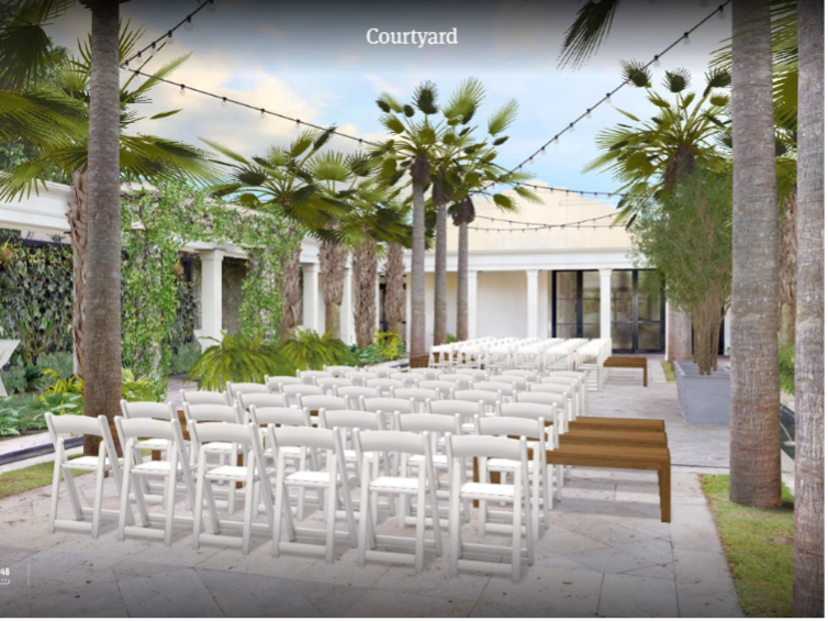 Screenshot from a 3D virtual tour in Prismm. It shows an outdoor wedding venue with rows of chairs and a blue sky.