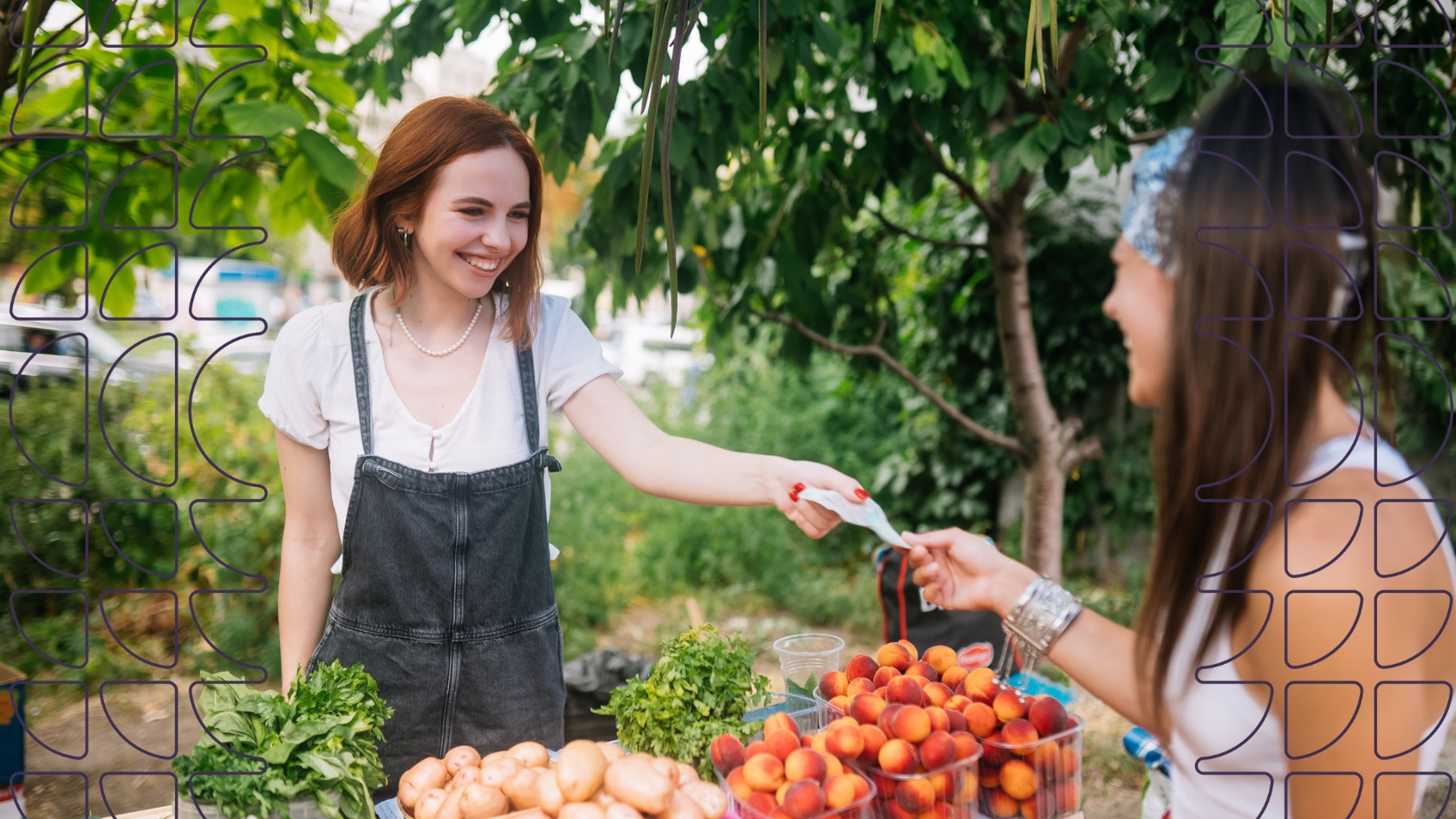 A food vendor at a farmer's market sells her produce to a customer.